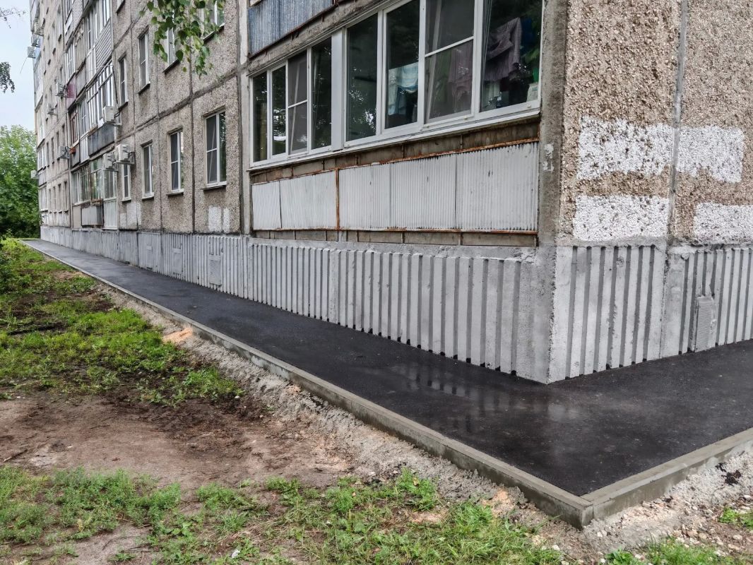 УК отремонтировала отмостку дома в Канавинском районе после вмешательства ГЖИ